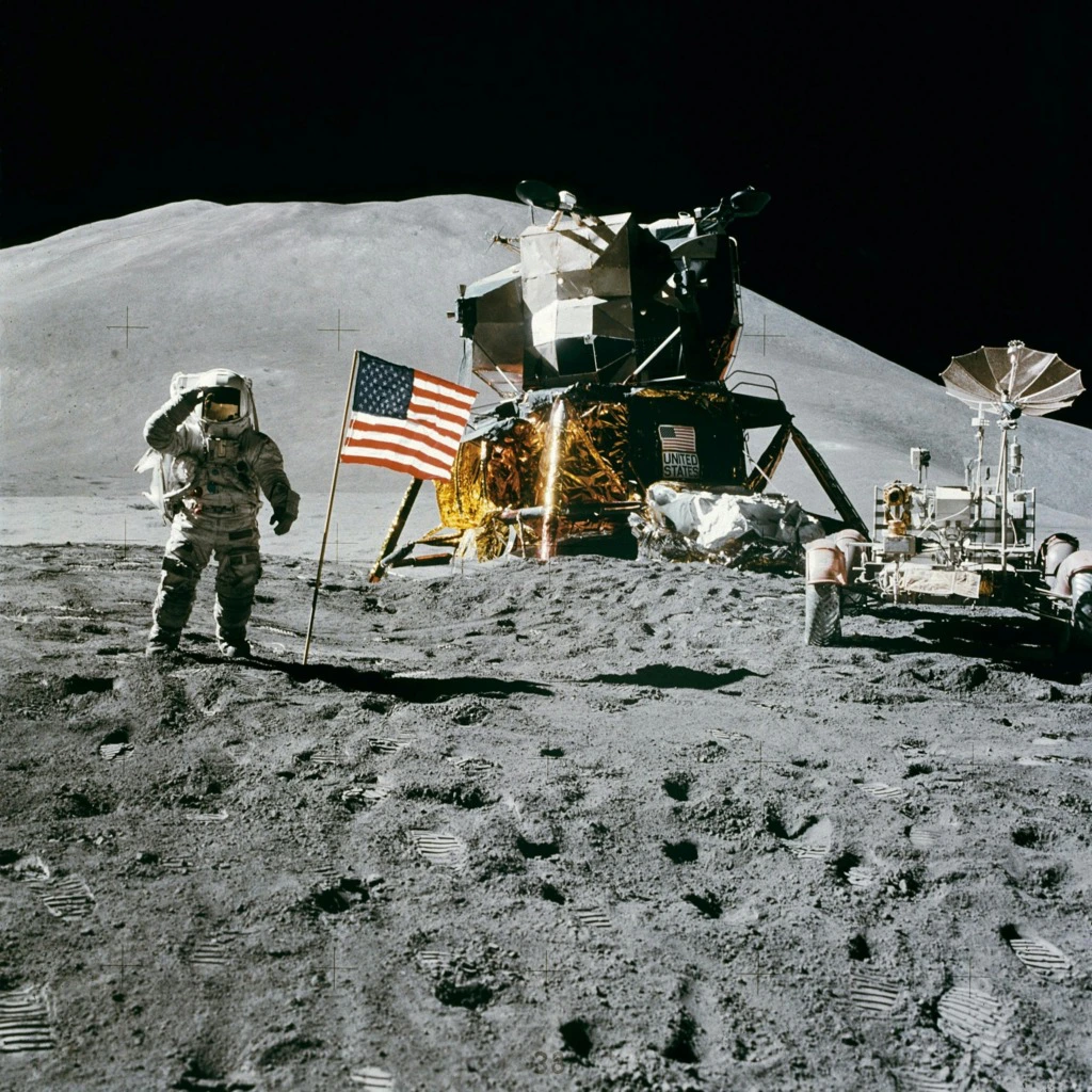 Astronaut Standing Beside American Flag on the Moon
